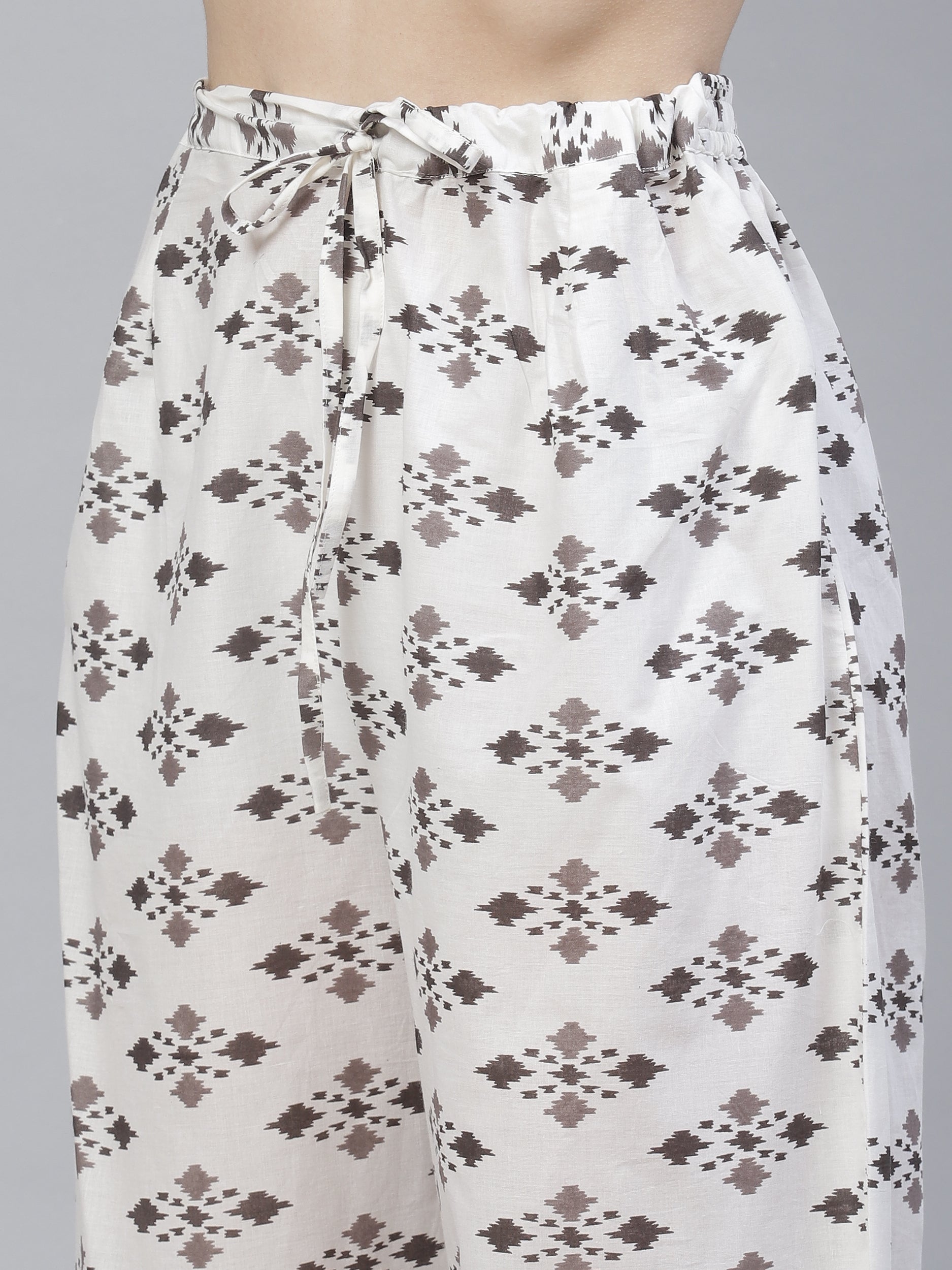Women's brown & white printed straight kurta with trousers - Meeranshi
